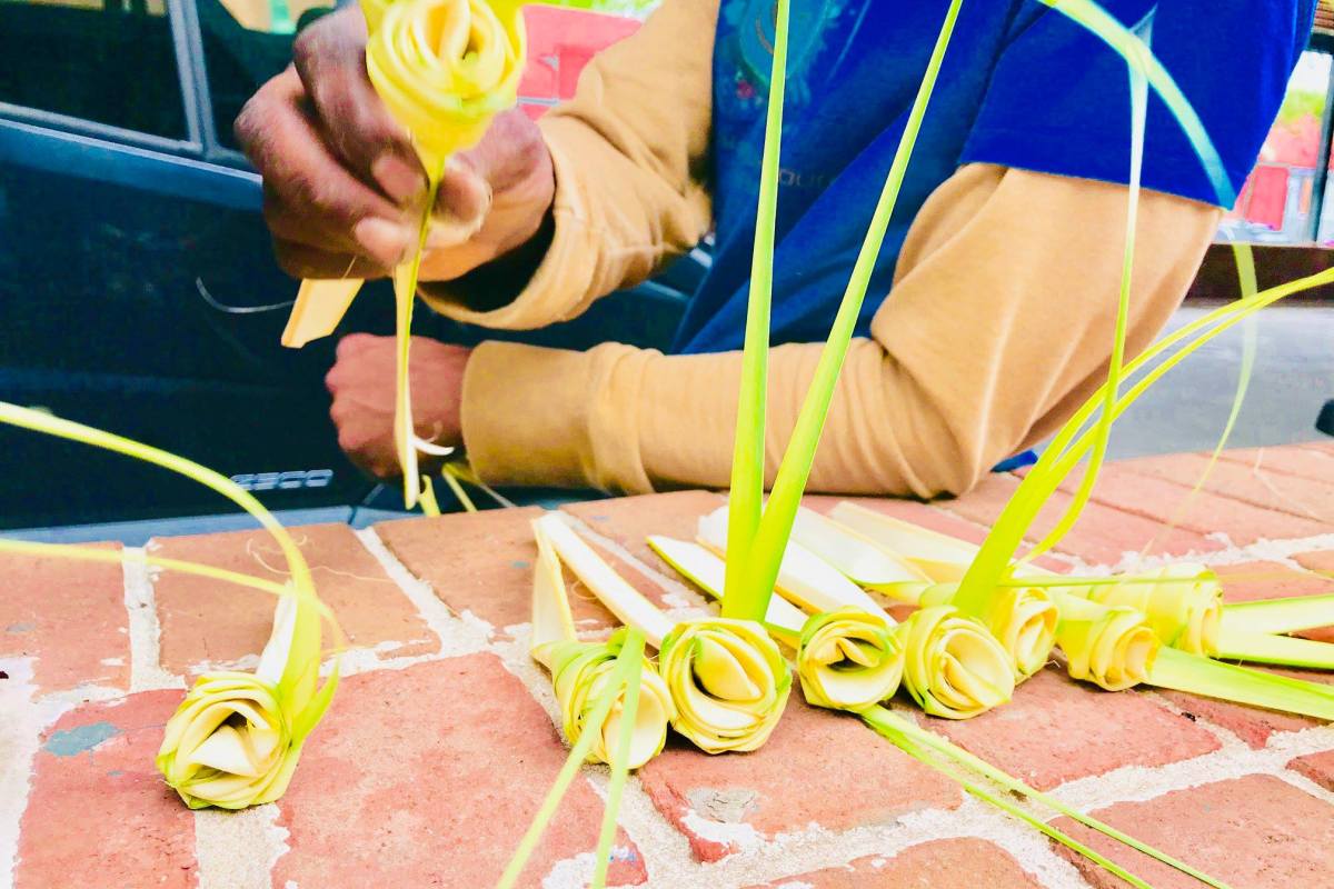 Freshly woven sweetgrass roses demonstrating Gullah Geechee craft traditions and cultural preservation